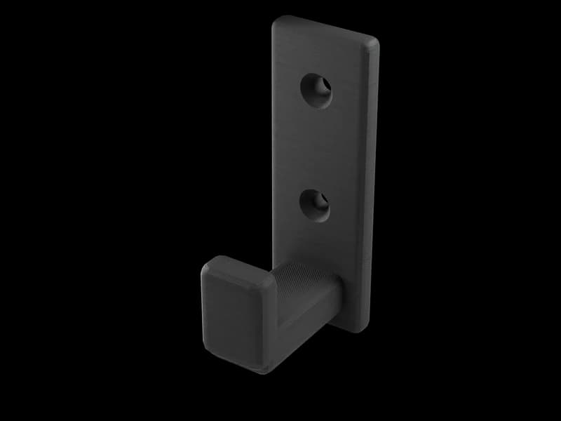 Render of a black PETG wall hook with two screw holes, printed layers visible